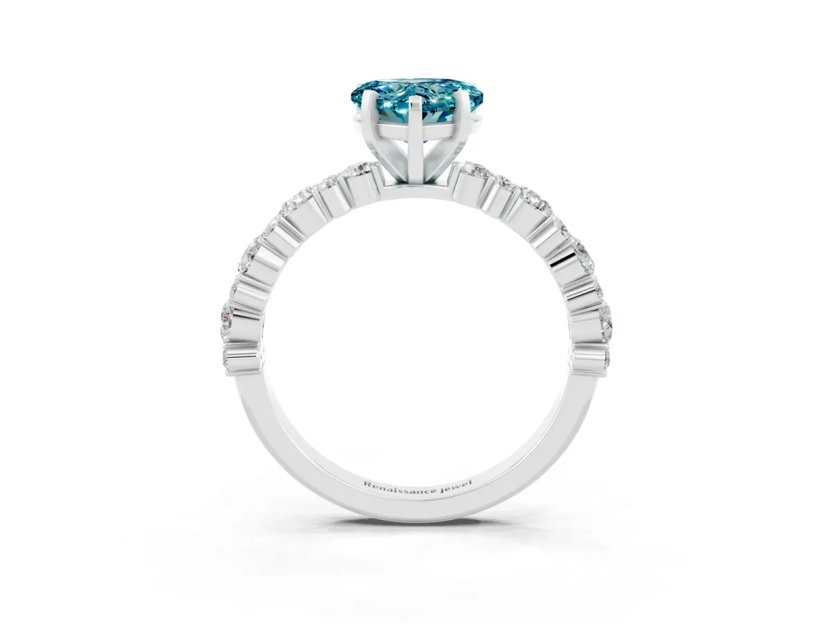 Heart Cut Blue Topaz Side Stone Solitaire Ring with Round and Four-Prong Setting Platinum