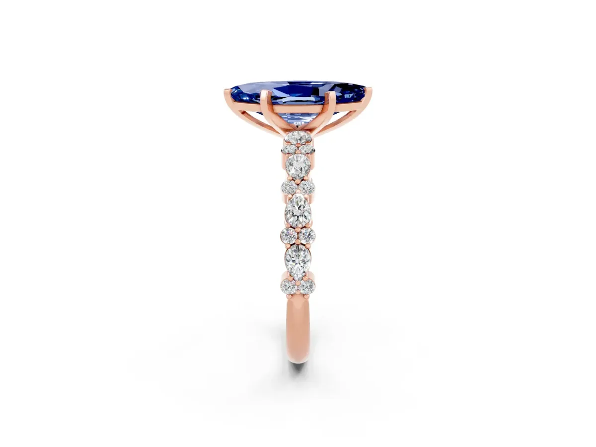 Marquise Cut Blue Sapphire Side Stone Solitaire Ring with Round and Four-Prong Setting Rose gold