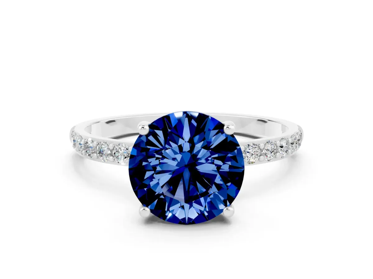 Round Cut Blue Sapphire Solitaire Ring with Round Pavé Band and Prong Setting White gold