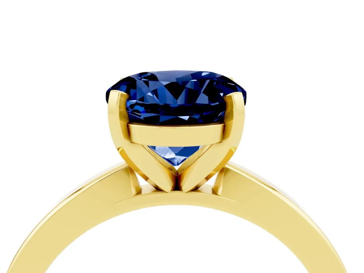 Round Cut Blue Sapphire Solitaire Engagement Ring with Classic Band and Four-Prong Setting Yellow gold