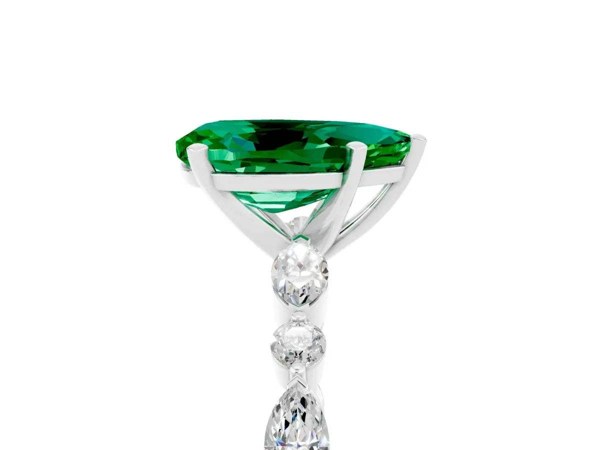 Pear Cut Emerald Ring with Marquise and Round Side Stones and Four-Prong Setting Platinum
