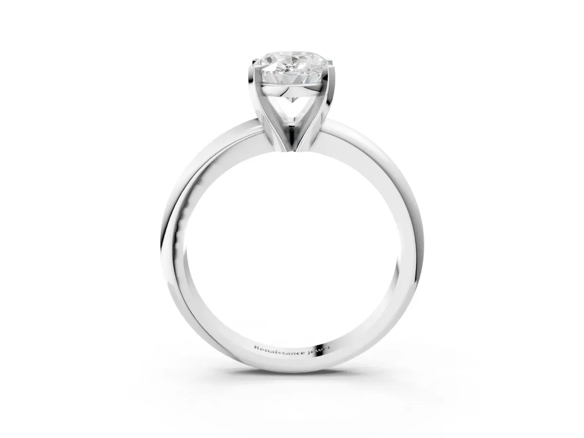 Oval Cut Diamond Solitaire Engagement Ring with Round Band and Four-Prong Setting White gold