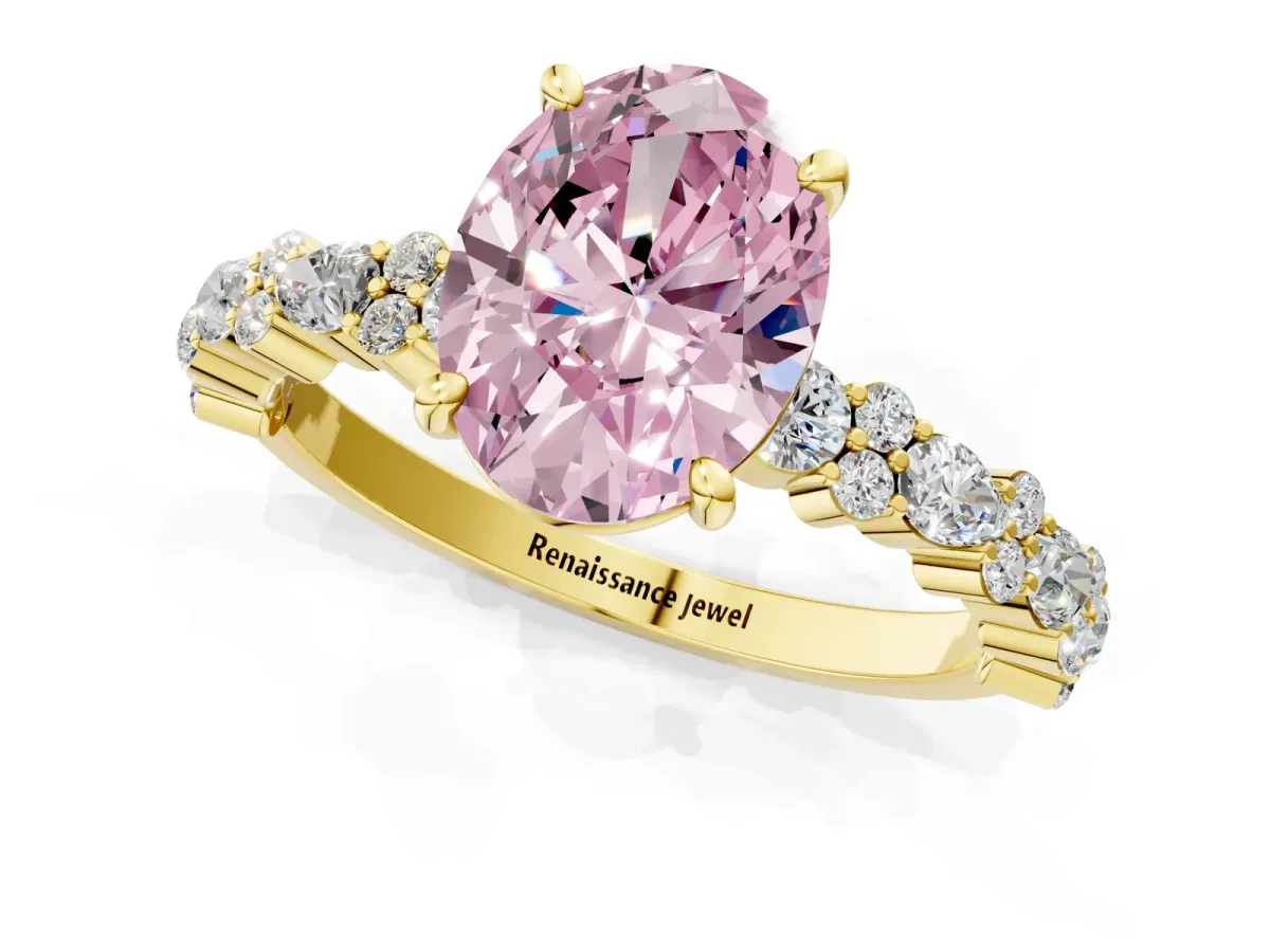 Fancy Pink Oval Cut Diamond Side Stone Solitaire Ring with Round and Four-Prong Setting Yellow gold