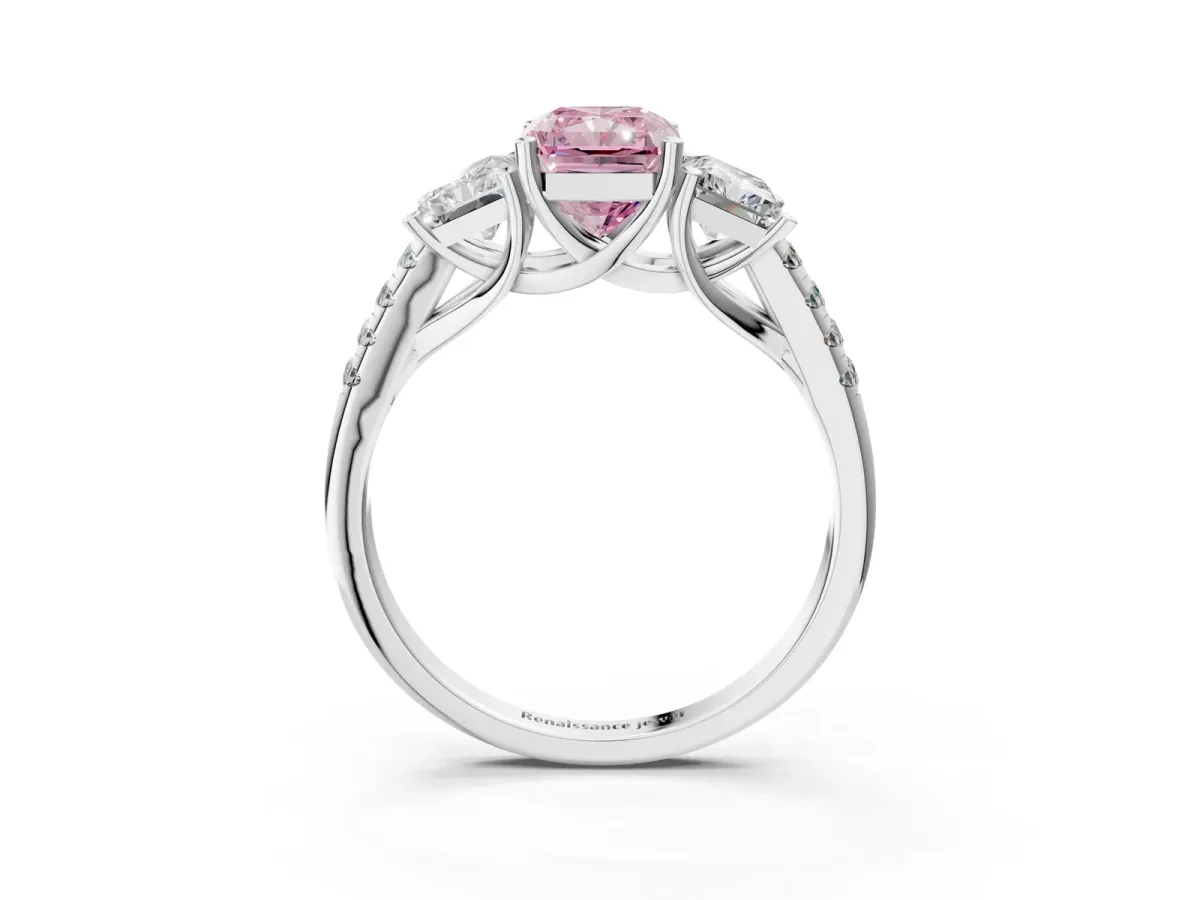 Fancy Pink Three-Stone Radiant Cut Diamond Ring with Round Pavé Band and Prong Setting Platinum
