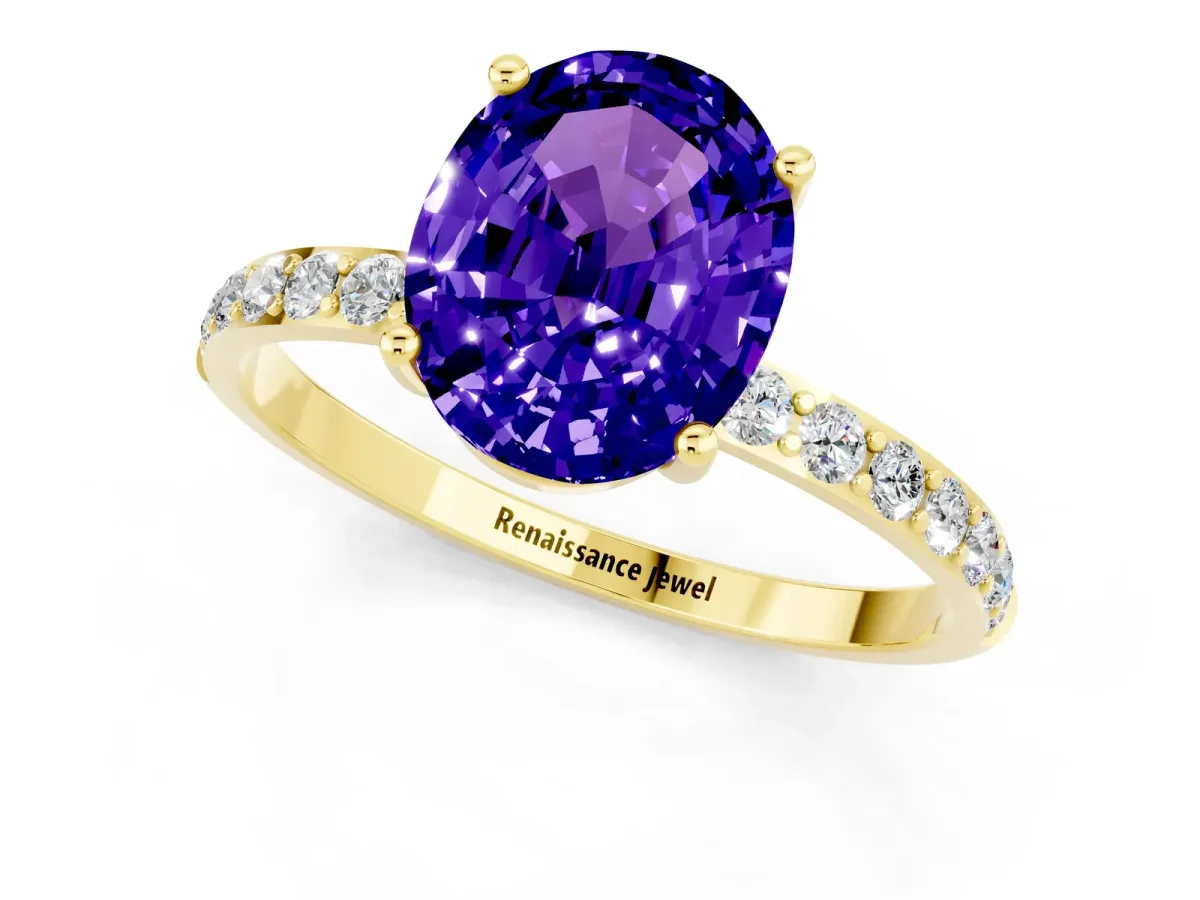 Oval Cut Tanzanite Solitaire Ring with Round Pavé Band and Prong Setting Yellow gold