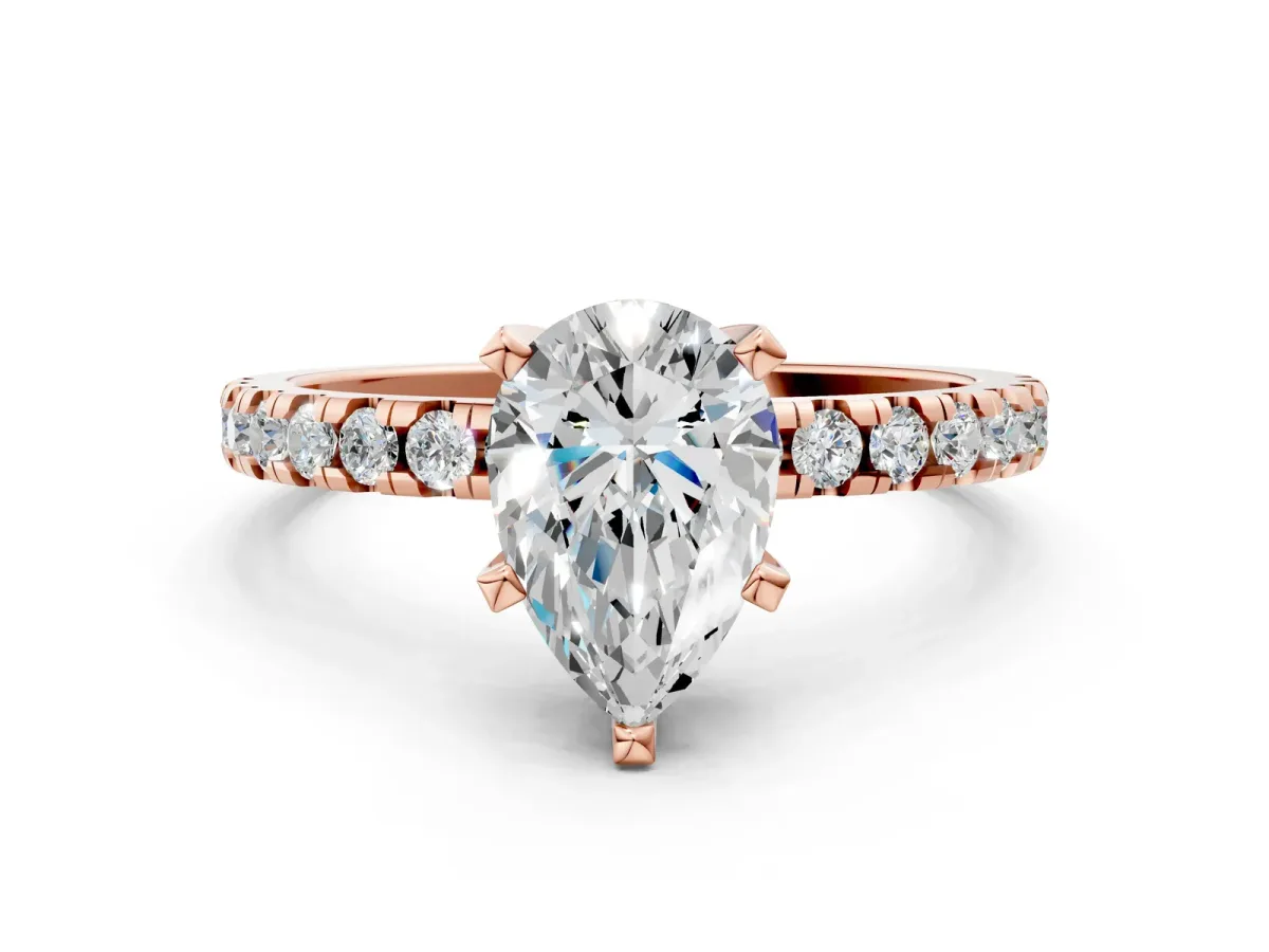 Pear Cut Diamond Solitaire Ring with Round Pavé Band and Four-Prong Setting Rose gold