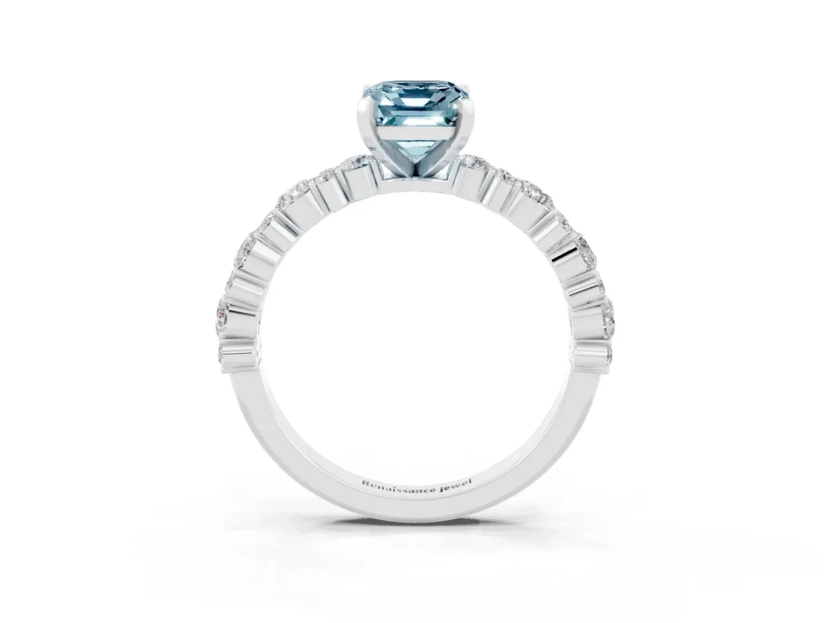 Emerald Cut Aquamarine Side Stone Solitaire Ring with Round and Four-Prong Setting White gold