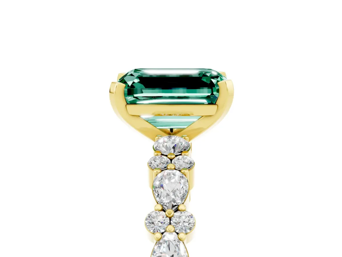 Emerald Cut Green Sapphire Side Stone Solitaire Ring with Round and Four-Prong Setting Yellow gold