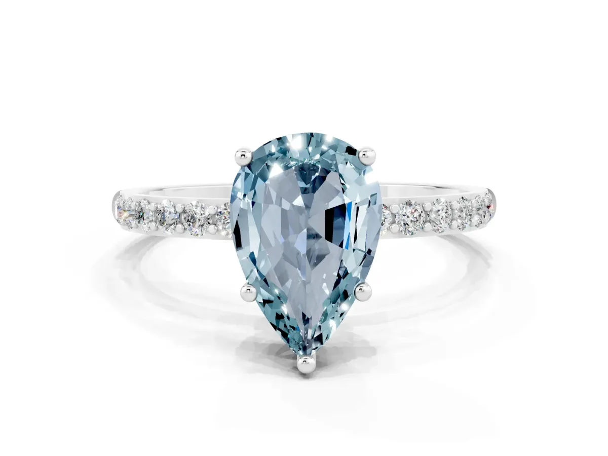Pear Cut Aquamarine Solitaire Ring with Round Pavé Band and Prong Setting Silver