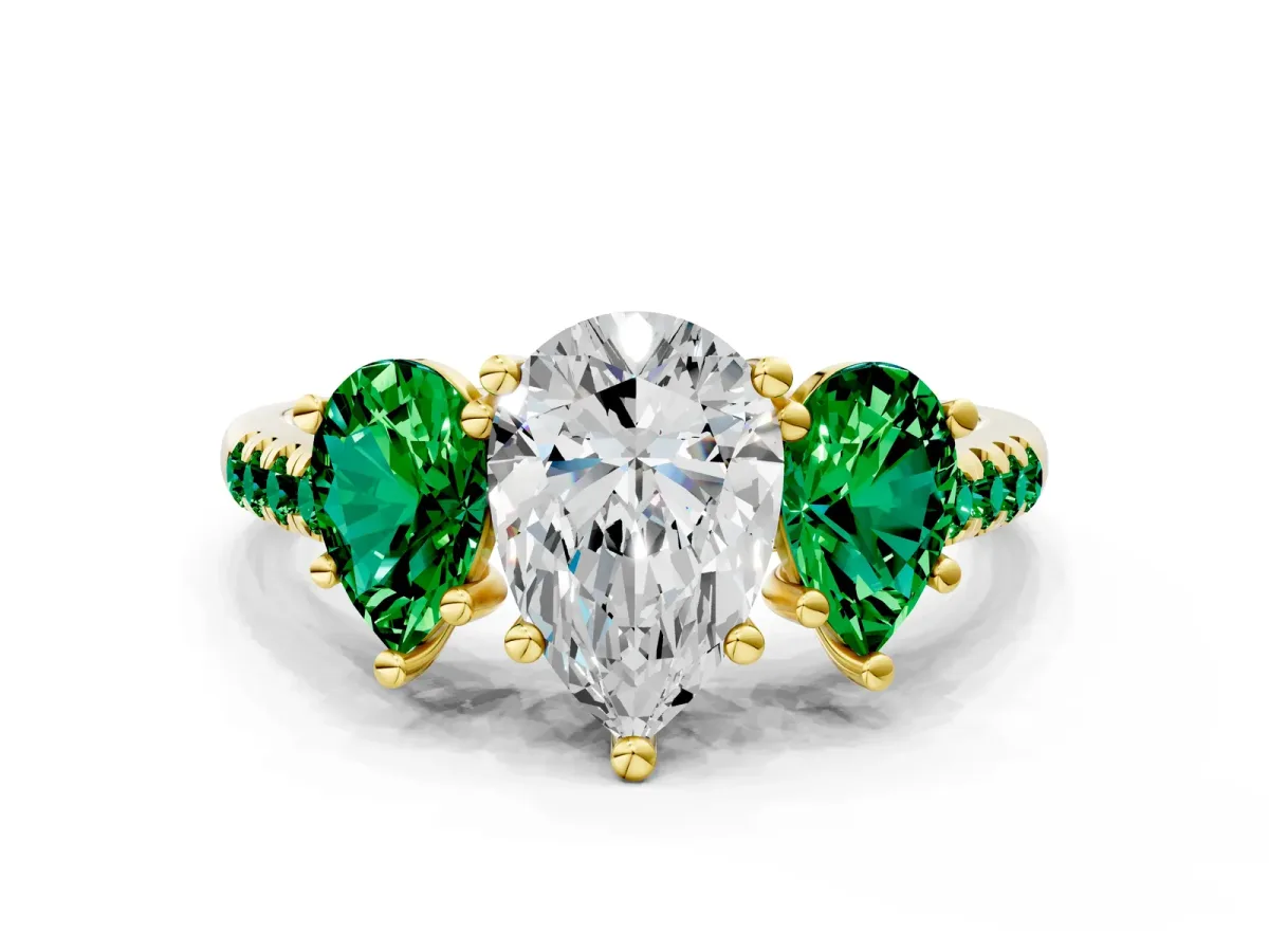Three-Stone Pear Cut Diamond Ring with Round Emerald Pavé Band and Prong Setting Yellow gold
