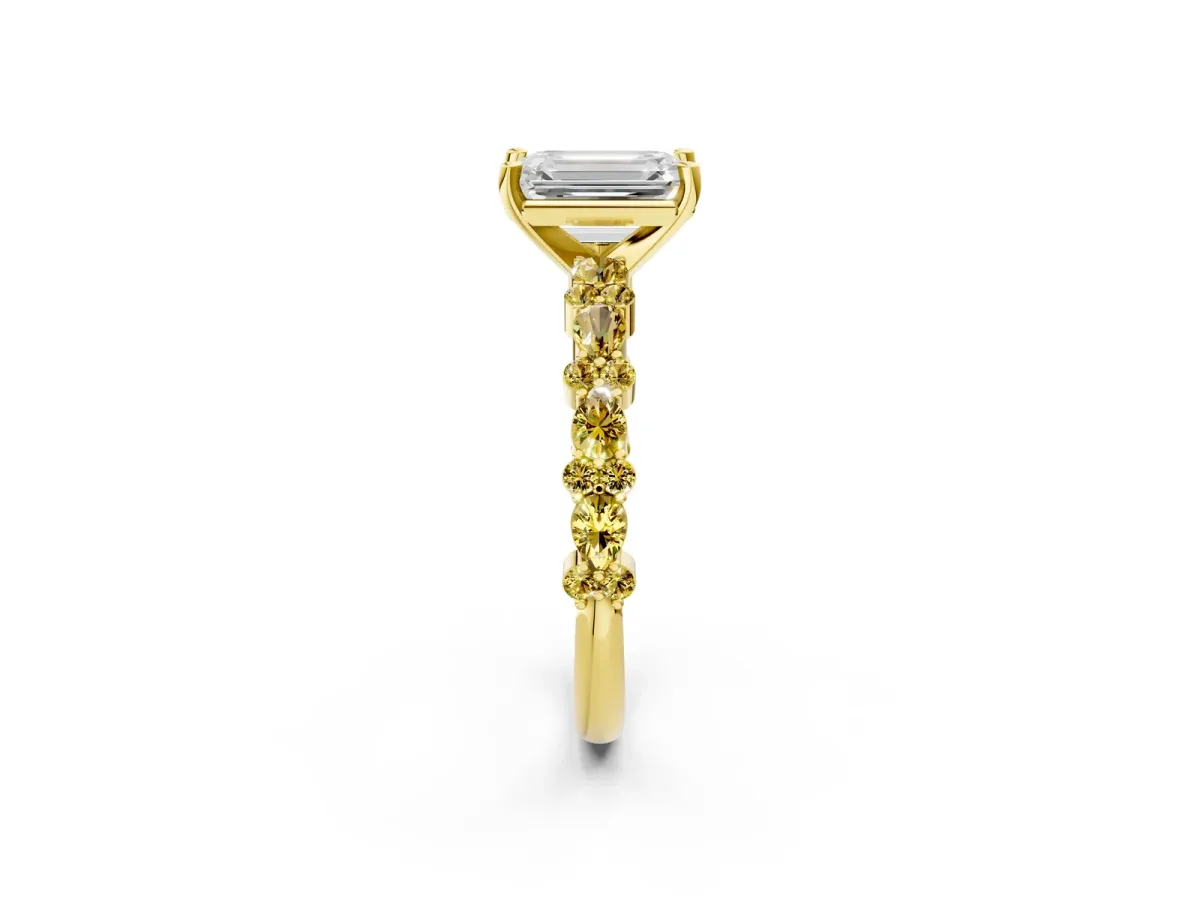 Emerald Cut Diamond Side Stone Solitaire Ring with Round Yellow Sapphire and Four-Prong Setting Yellow gold