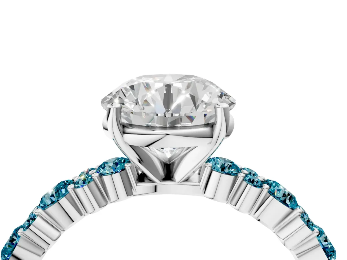 Round Cut Diamond Side Stone Solitaire Ring with Round Tanzanite and Four-Prong Setting Silver