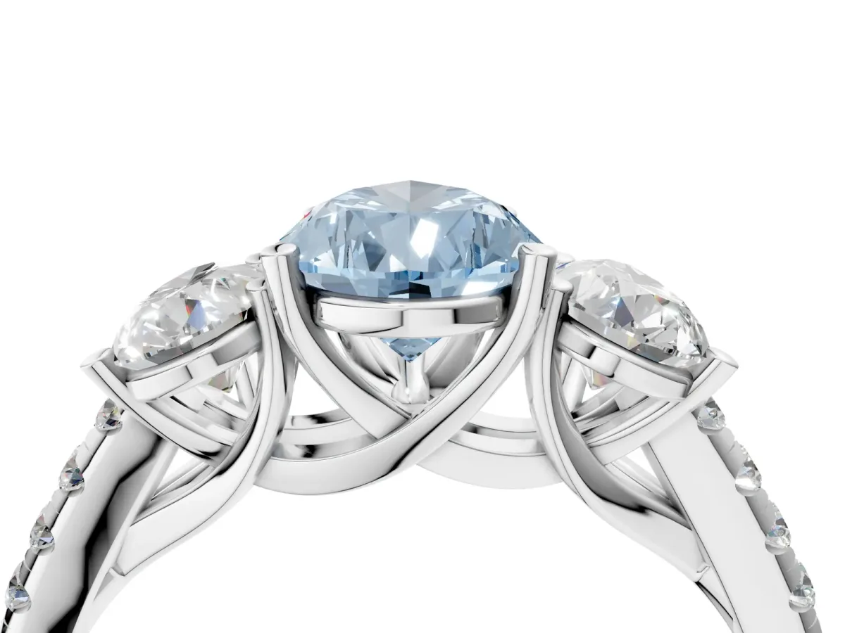 Fancy Blue Three-Stone Pear Cut Diamond Ring with Round Pavé Band and Prong Setting Silver