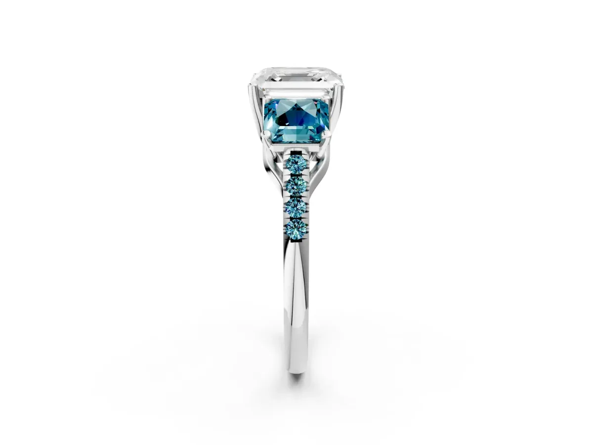 Three-Stone Asscher Cut Diamond Ring with Round Blue Topaz Pavé Band and Prong Setting White gold