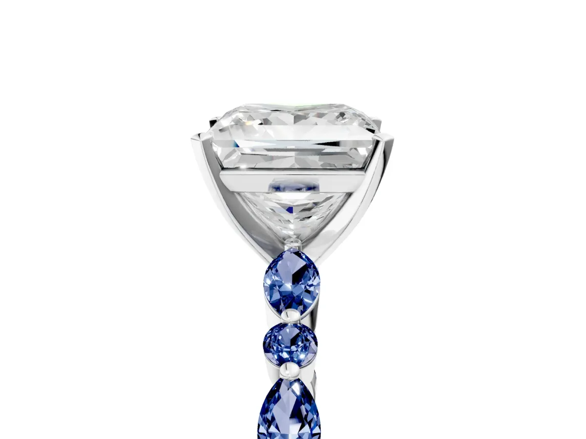 Princess Cut Diamond Ring with Marquise and Round Blue Sapphire Side Stones and Four-Prong Setting Platinum