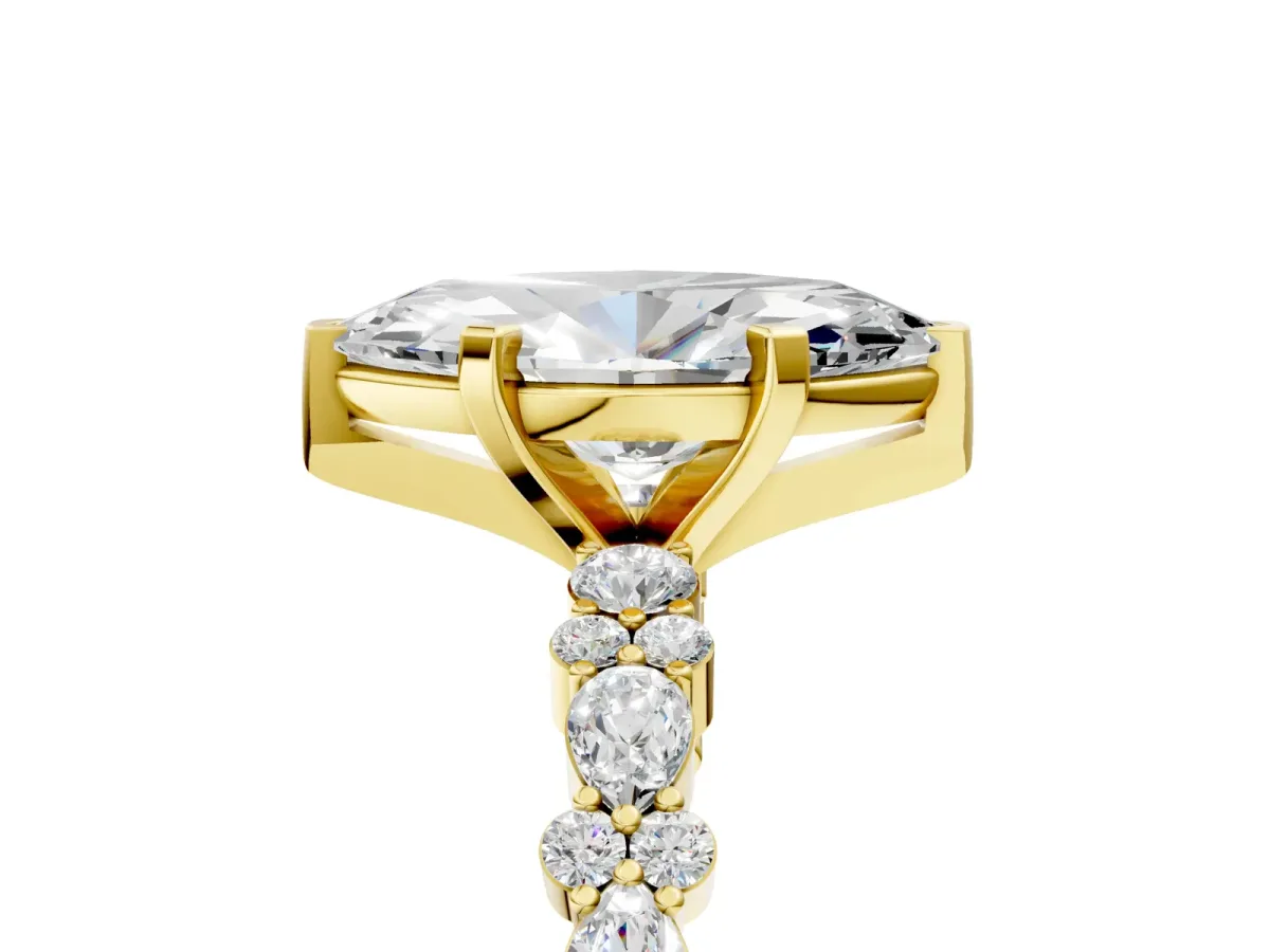 Marquise Cut Diamond Side Stone Solitaire Ring with Round Moissanite and Four-Prong Setting Yellow gold