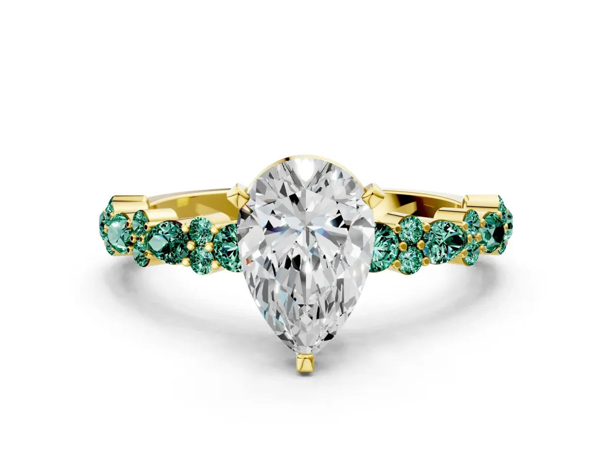 Pear Cut Diamond Side Stone Solitaire Ring with Round Green Sapphire and Four-Prong Setting Yellow gold