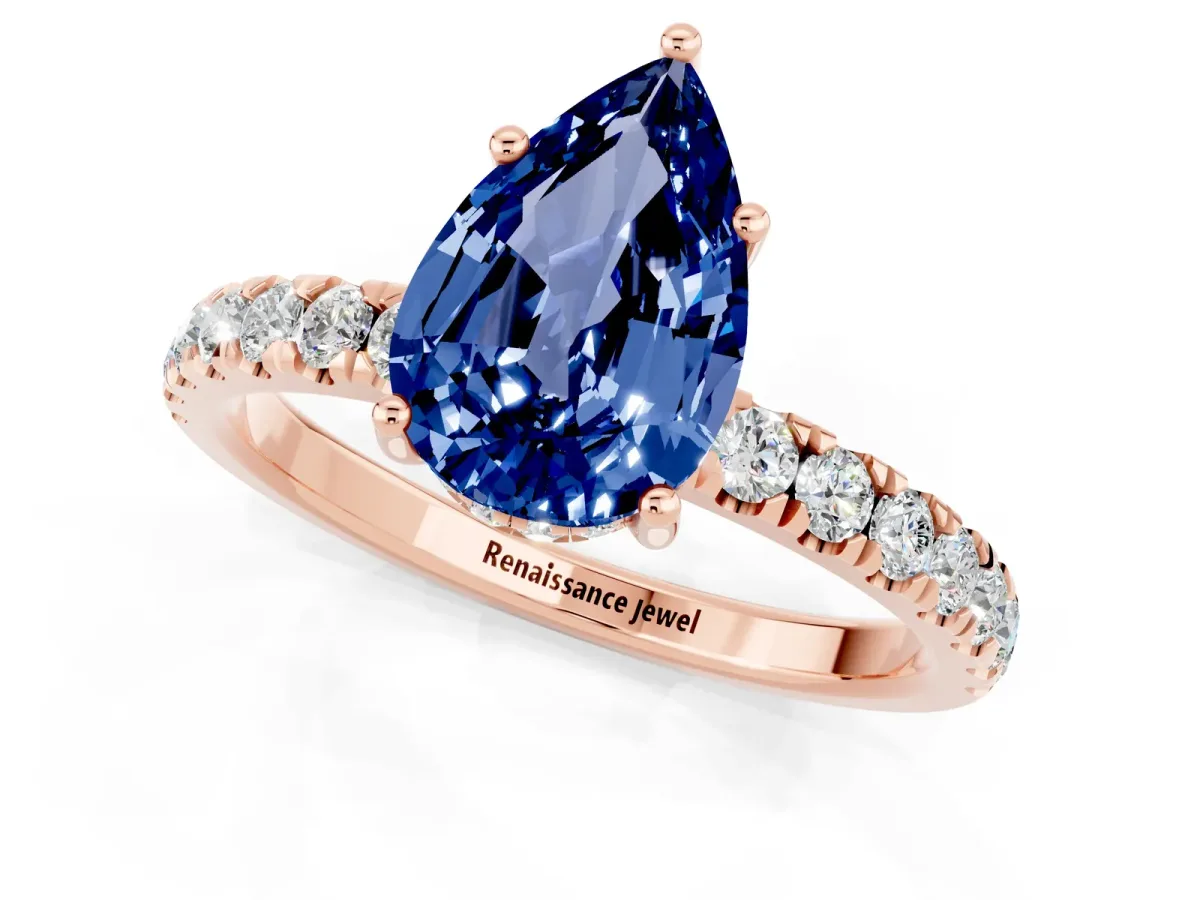 Pear Cut Blue Sapphire Pave Band Solitaire Ring with Round and Prong Setting Rose gold