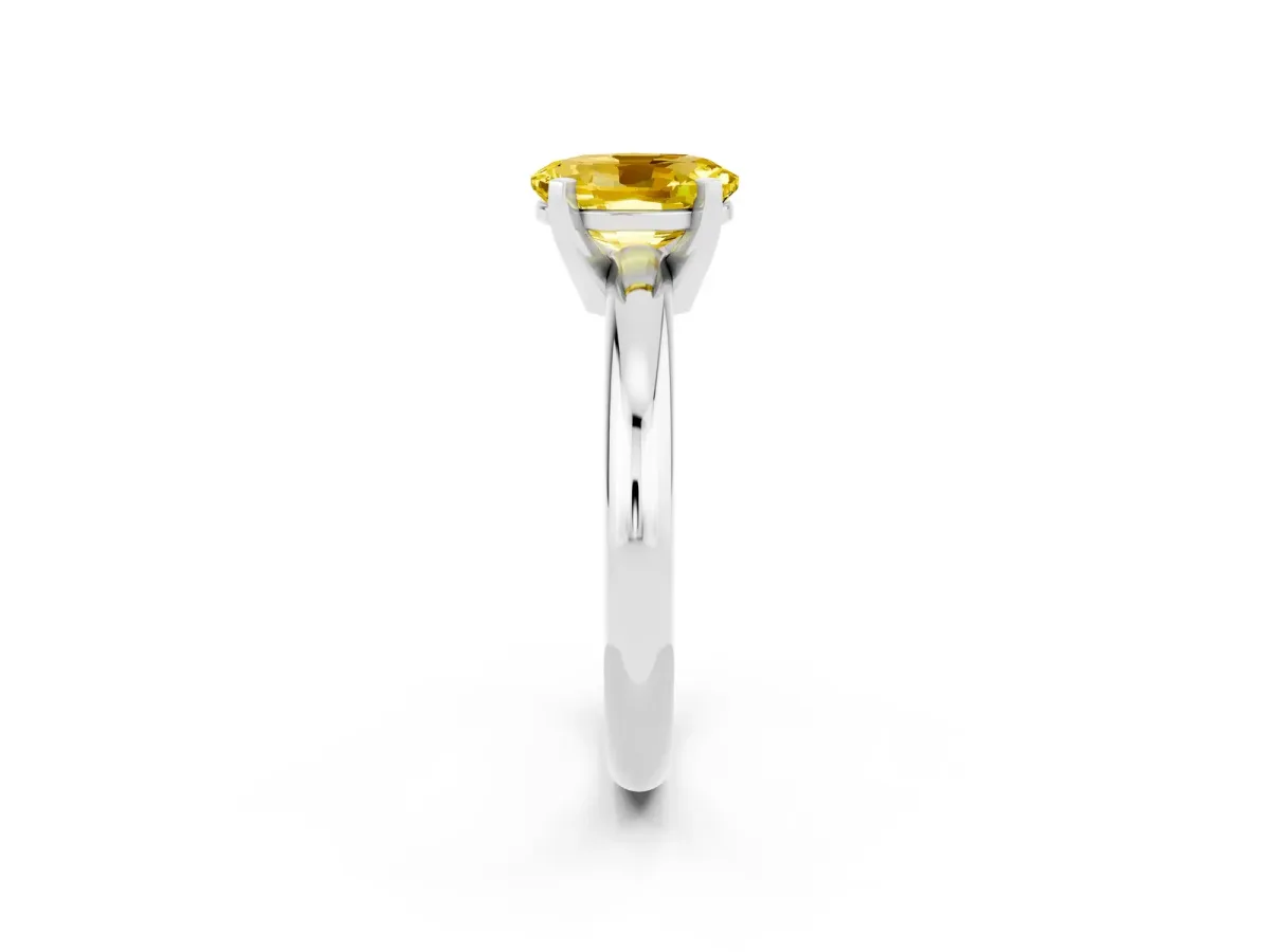Oval Cut Yellow Sapphire Solitaire Engagement Ring with Round Band and Four-Prong Setting Silver