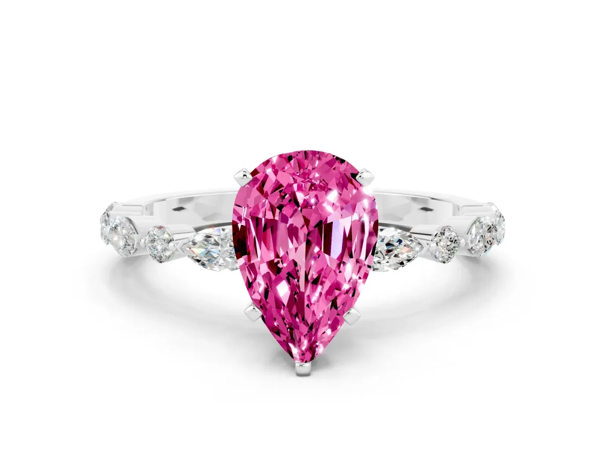 Pear Cut Pink Sapphire Ring with Marquise and Round Side Stones and Four-Prong Setting Silver