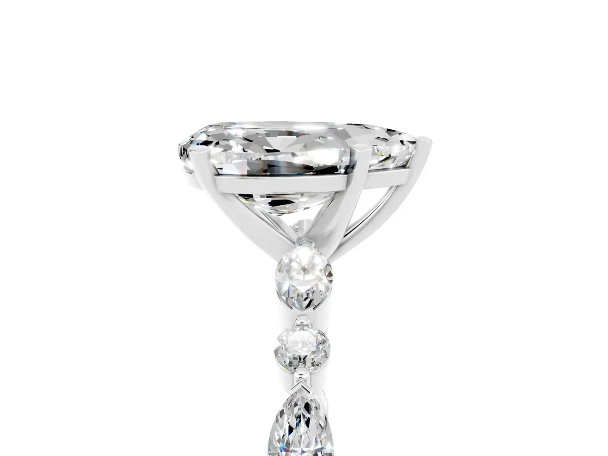 Pear Cut Moissanite Ring with Marquise and Round Side Stones and Four-Prong Setting Platinum
