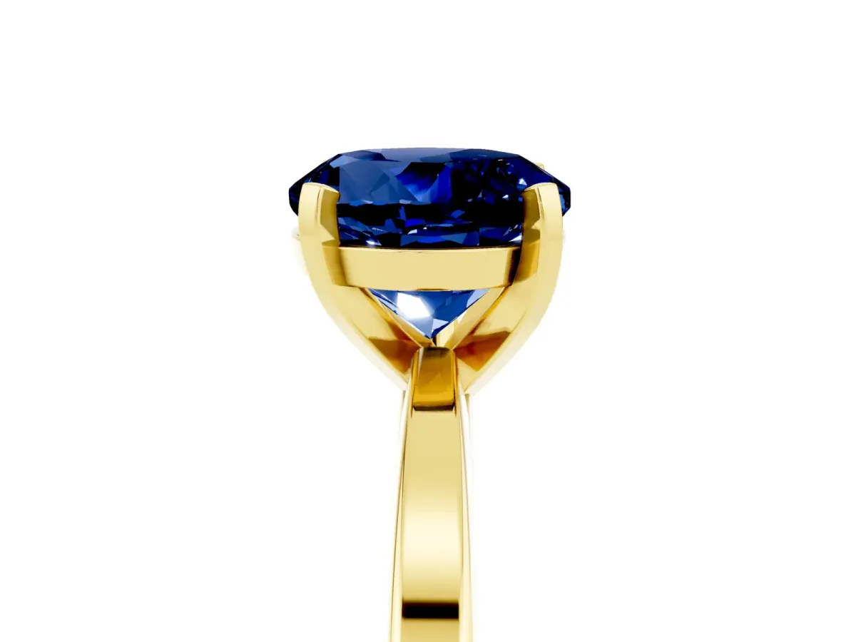 Round Cut Blue Sapphire Solitaire Engagement Ring with Classic Band and Four-Prong Setting Yellow gold