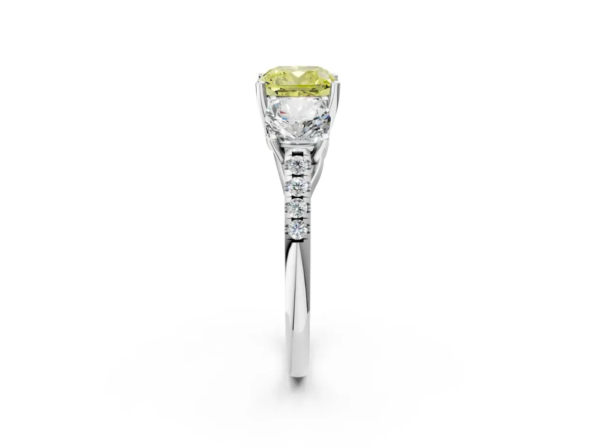 Fancy Yellow Three-Stone Cushion Cut Diamond Ring with Round Pavé Band and Prong Setting Silver