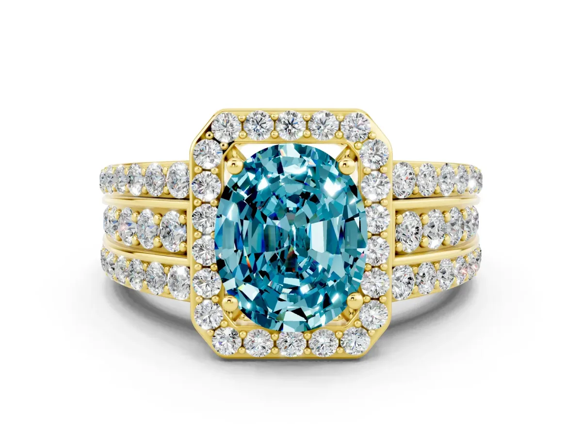 Oval Cut Halo Blue Topaz Ring with Round Split Shank and Prong Setting Yellow gold
