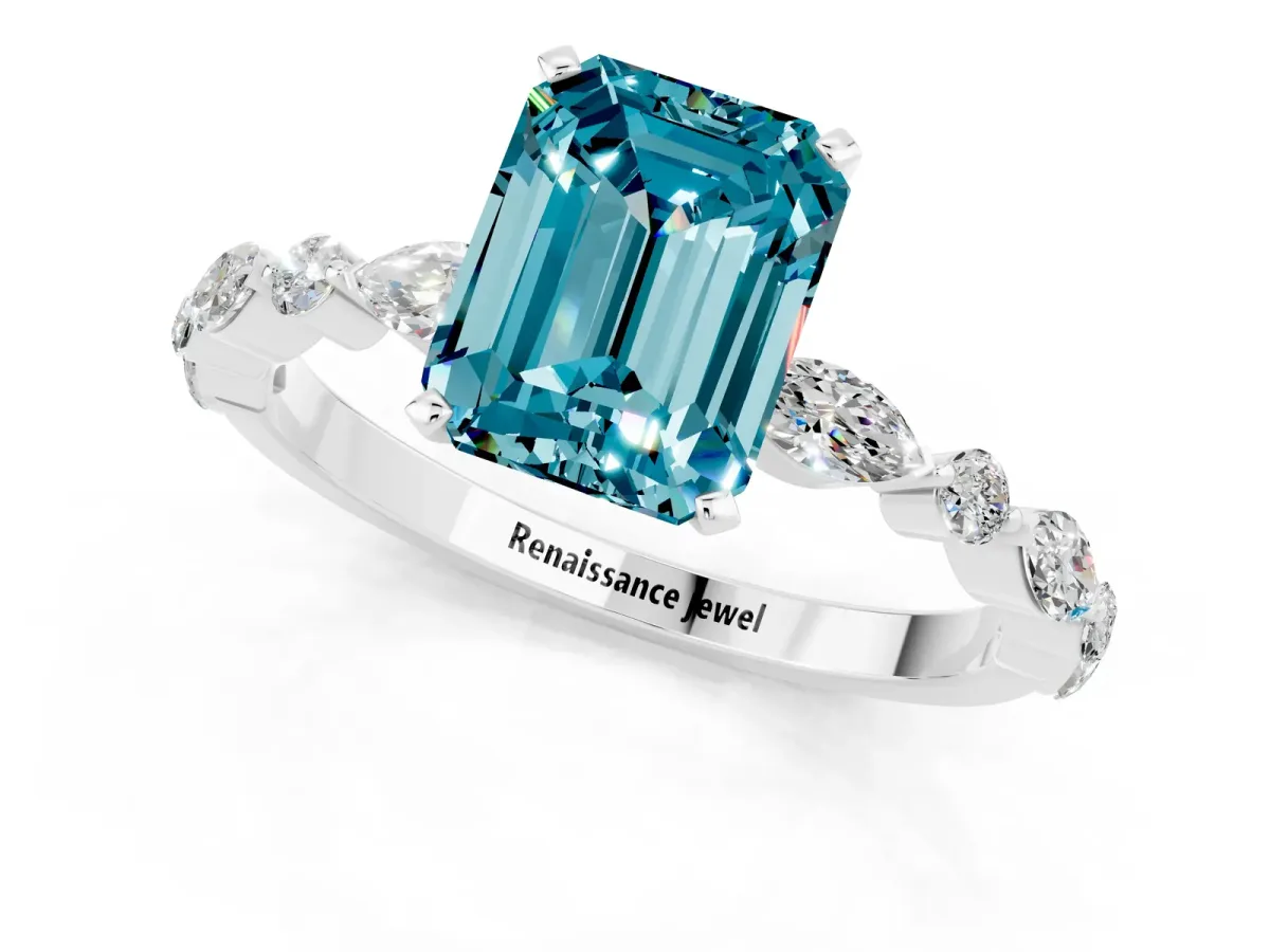 Emerald Cut Blue Topaz Ring with Marquise and Round Side Stones and Four-Prong Setting Silver