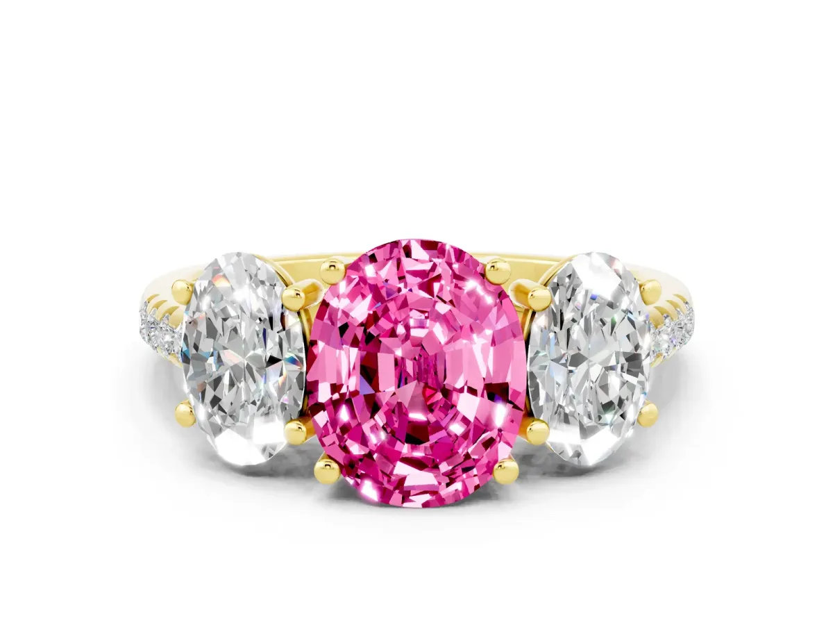 Three-Stone Oval Cut Pink Sapphire Ring with Round Pavé Band and Prong Setting Yellow gold
