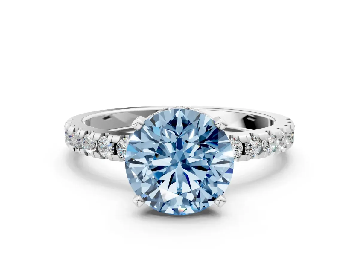 Fancy Blue Round Cut Diamond Solitaire Ring with Round Pavé Band and Four-Prong Setting White gold