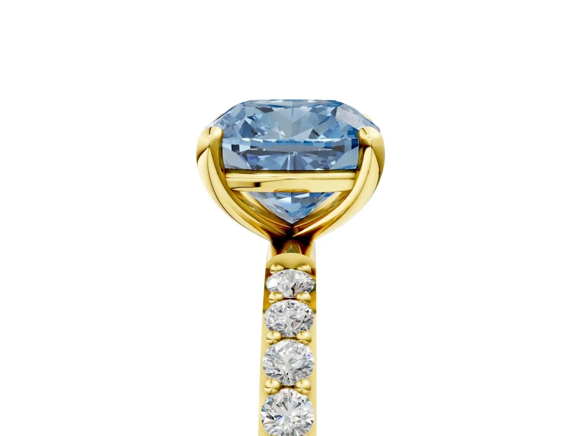 Fancy Blue Cushion Cut Diamond Solitaire Ring with Round Pavé Band and Prong Setting Yellow gold
