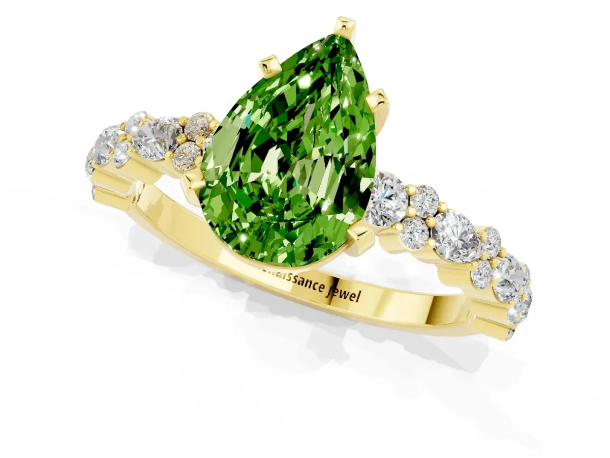 Pear Cut Peridot Side Stone Solitaire Ring with Round and Four-Prong Setting Yellow gold