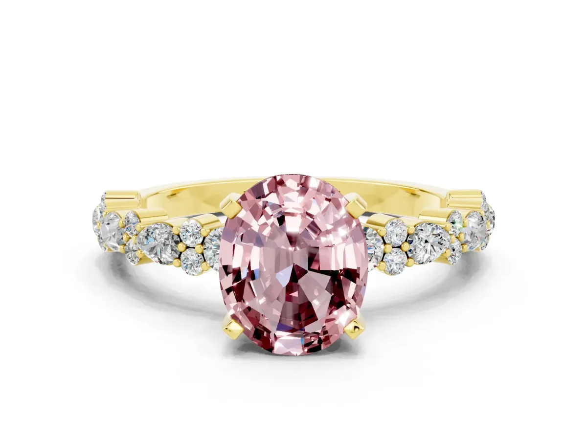 Oval Cut Morganite Side Stone Solitaire Ring with Round and Four-Prong Setting Yellow gold
