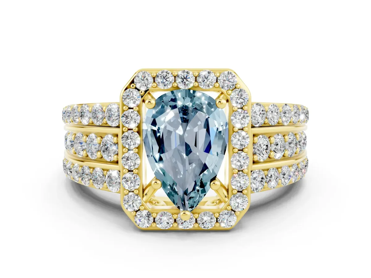 Pear Cut Halo Aquamarine Ring with Round Split Shank and Prong Setting Yellow gold