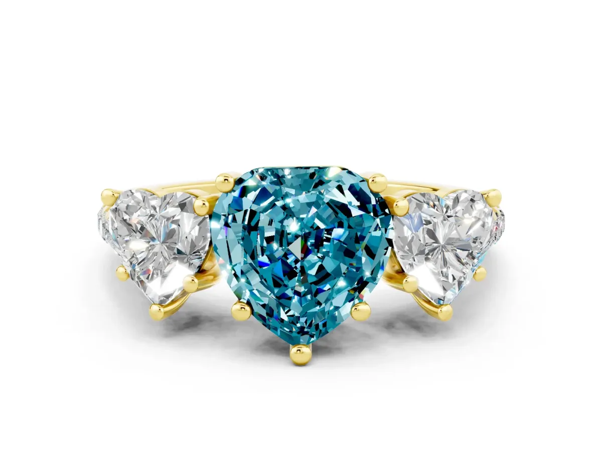 Three-Stone Heart Cut Blue Topaz Ring with Round Pavé Band and Prong Setting Yellow gold