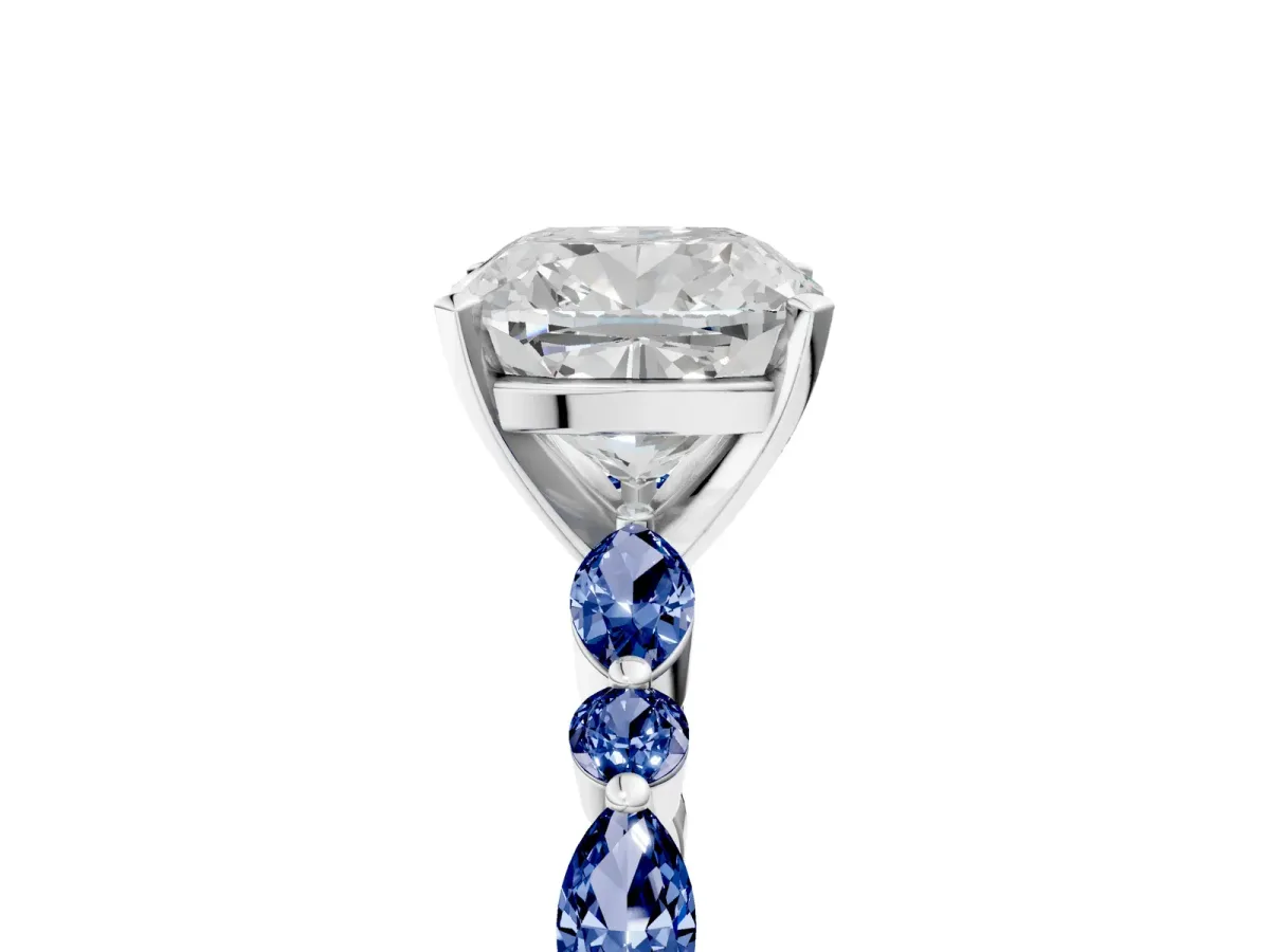 Cushion Cut Diamond Ring with Marquise and Round Blue Sapphire Side Stones and Four-Prong Setting Silver