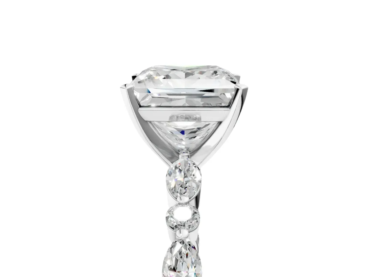 Princess Cut Diamond Ring with Marquise and Round Side Stones and Four-Prong Setting Silver