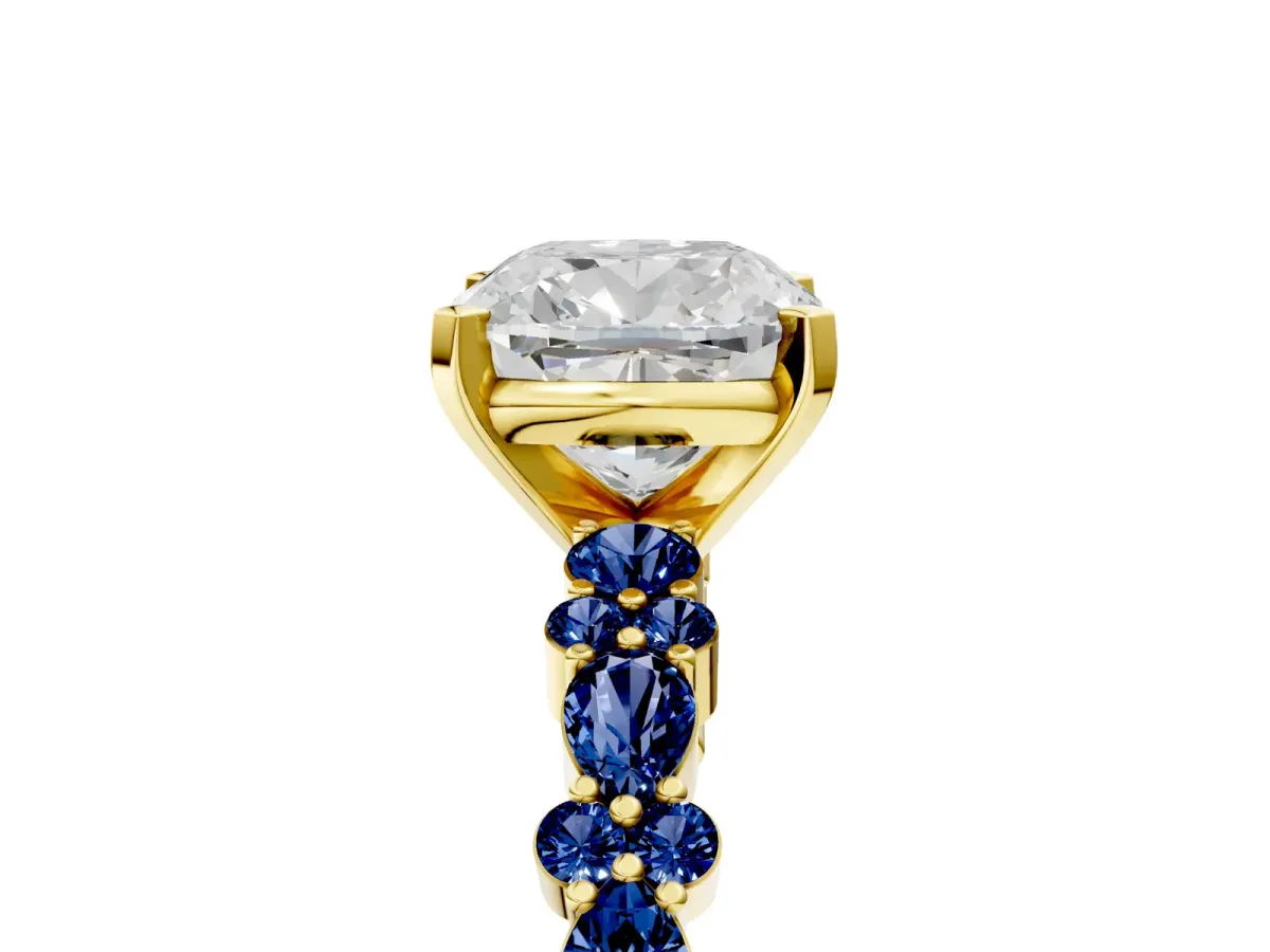 Cushion Cut Diamond Side Stone Solitaire Ring with Round Blue Sapphire and Four-Prong Setting Yellow gold