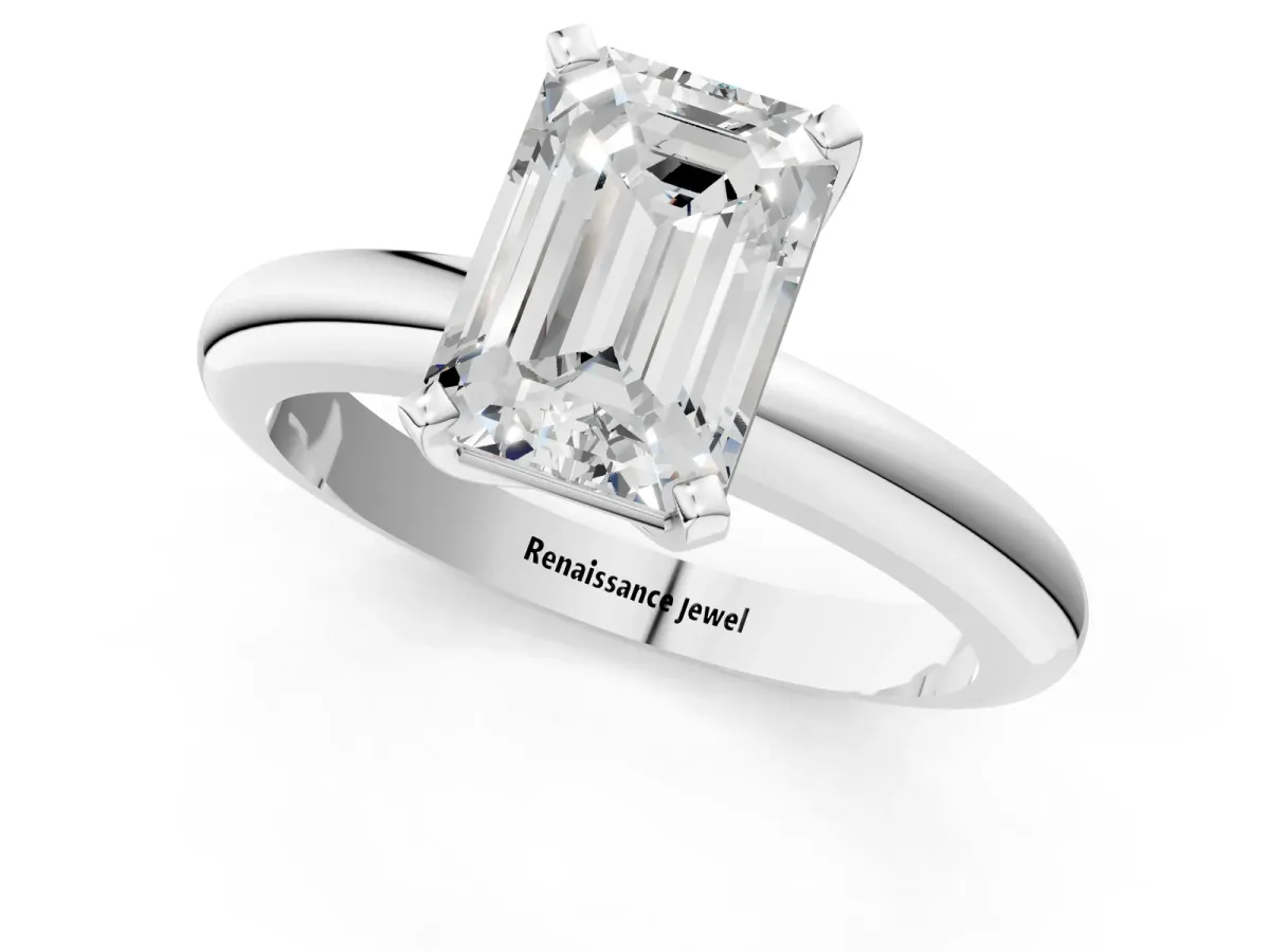 Emerald Cut Diamond Solitaire Engagement Ring with Round Band and Four-Prong Setting Silver