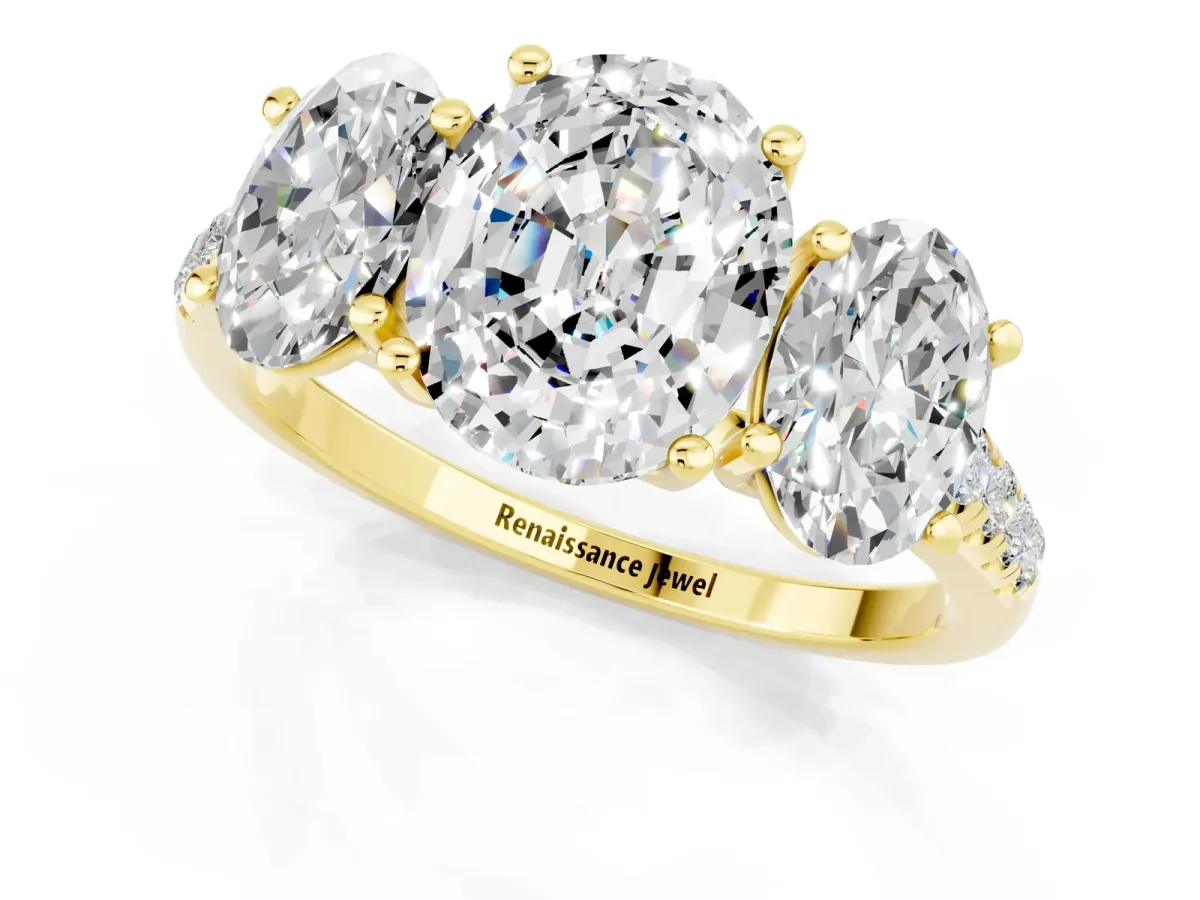 Three-Stone Oval Cut Moissanite Ring with Round Pavé Band and Prong Setting Yellow gold