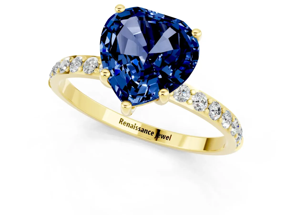 Heart Cut Blue Sapphire Solitaire Ring with Round Pavé Band and Prong Setting Yellow gold