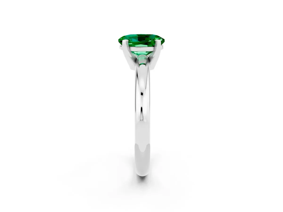 Oval Cut Emerald Solitaire Engagement Ring with Round Band and Four-Prong Setting Platinum