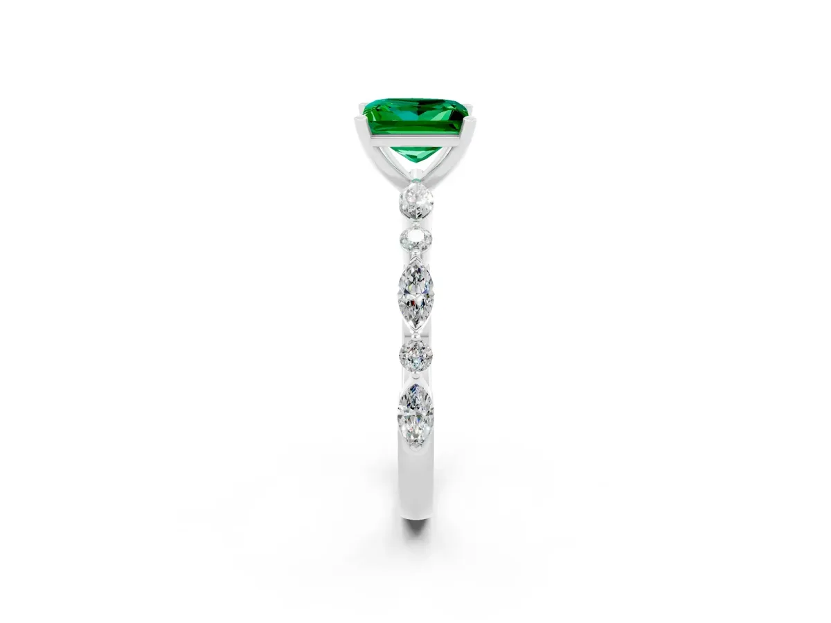 Princess Cut Emerald Ring with Marquise and Round Side Stones and Four-Prong Setting Silver