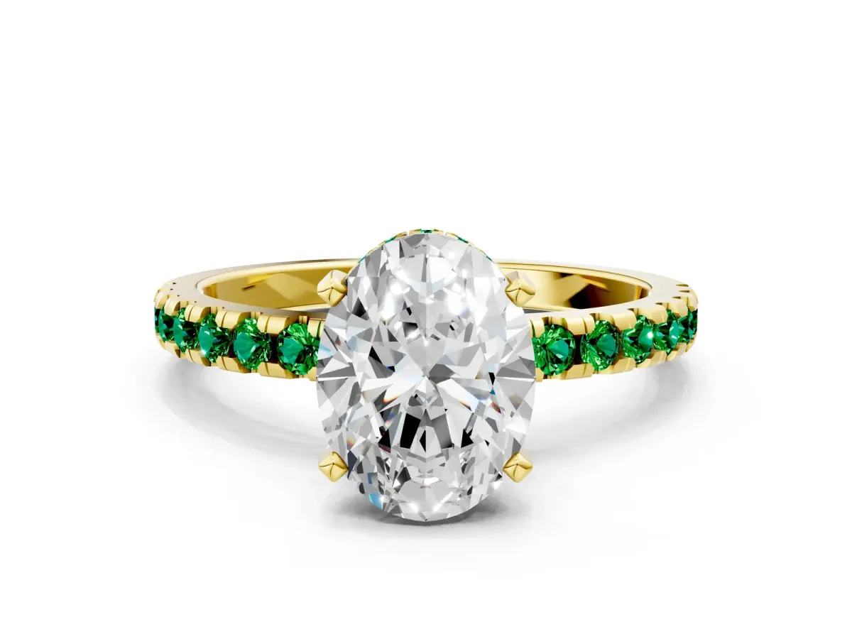 Oval Cut Diamond Solitaire Ring with Round Emerald Pavé Band and Four-Prong Setting Yellow gold