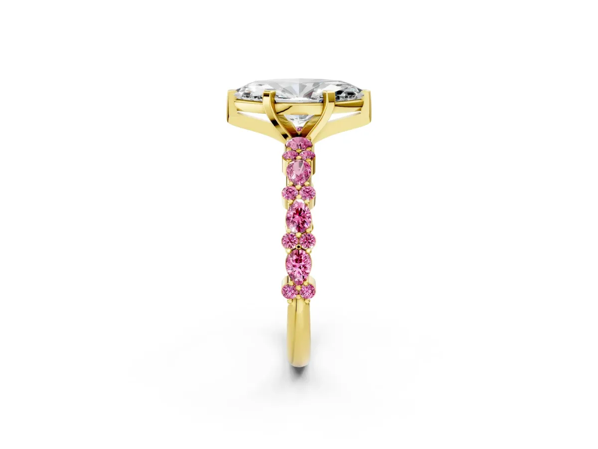 Marquise Cut Diamond Side Stone Solitaire Ring with Round Pink Sapphire and Four-Prong Setting Yellow gold