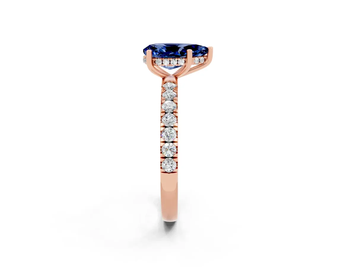 Pear Cut Blue Sapphire Pave Band Solitaire Ring with Round and Prong Setting Rose gold