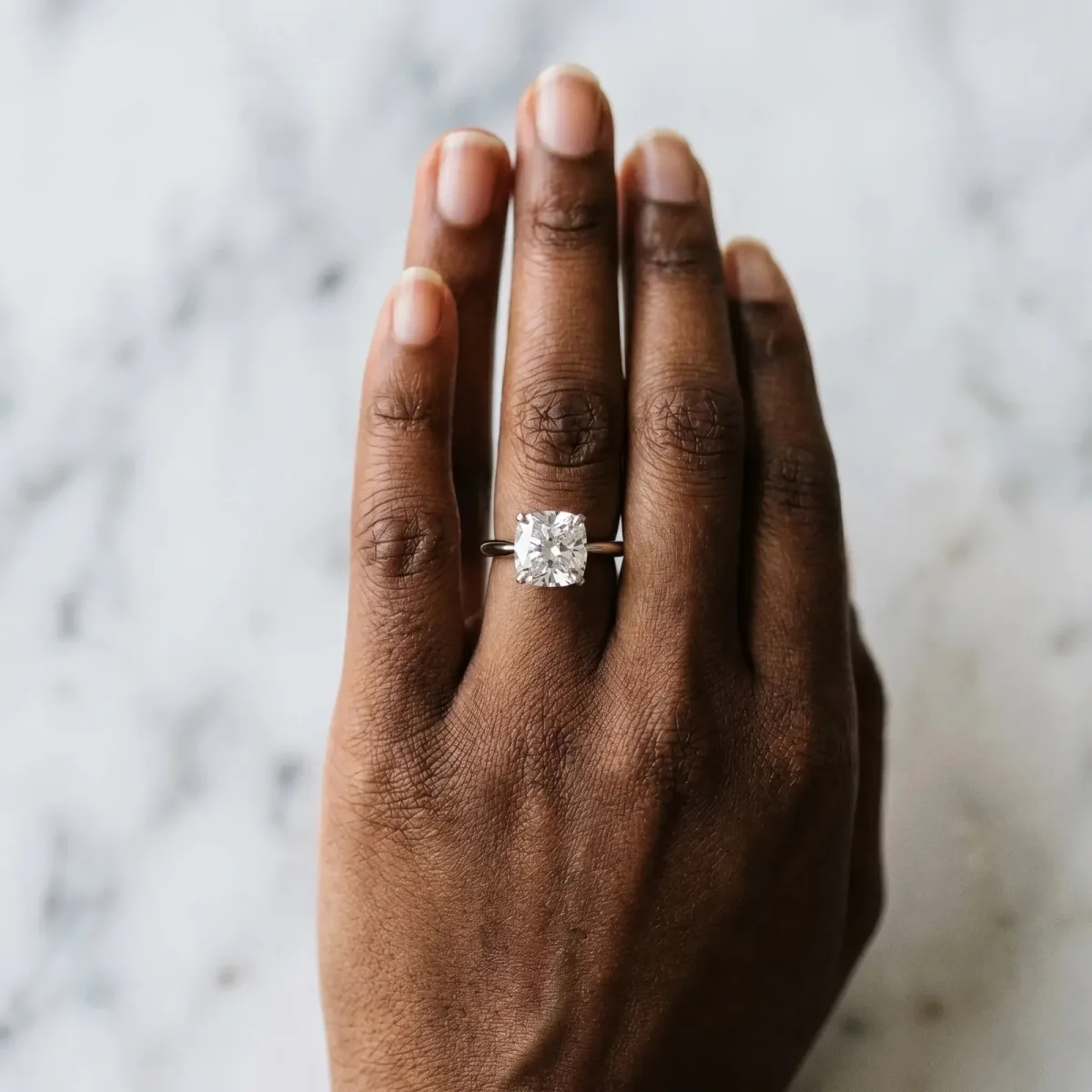 Cushion Cut Diamond Solitaire Engagement Ring with Classic Band and Four-Prong Setting Silver
