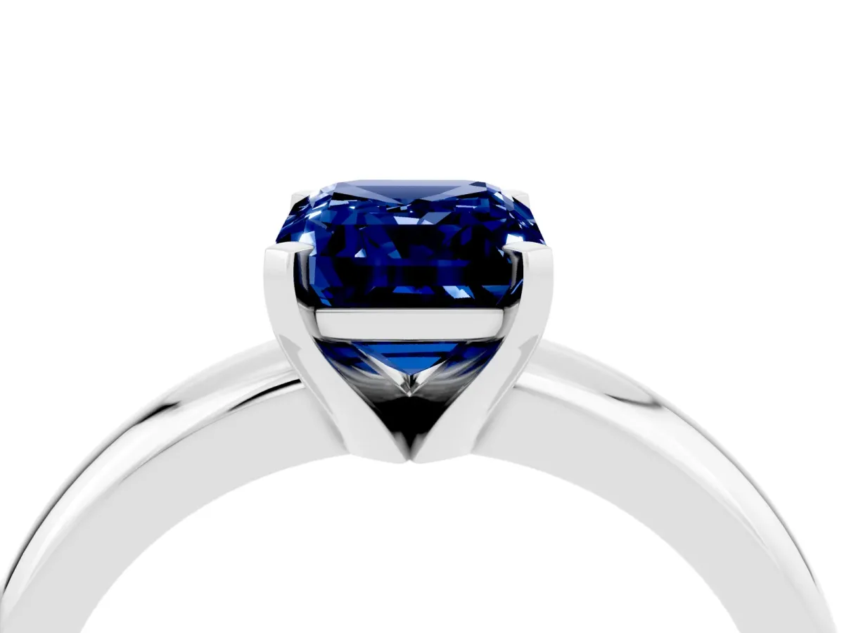 Emerald Cut Blue Sapphire Solitaire Engagement Ring with Round Band and Four-Prong Setting Platinum