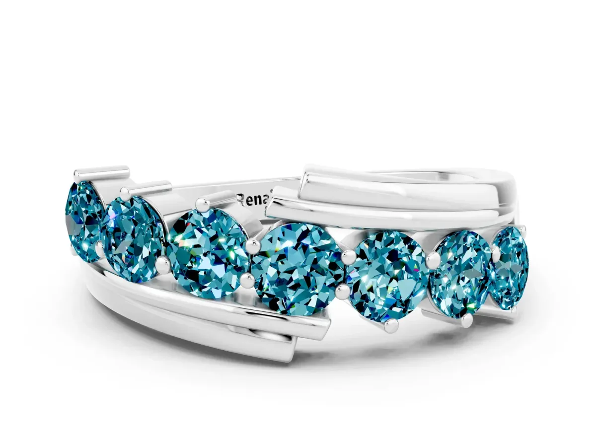 Round Blue Topaz Wave Band with Channel and Shared Prong Setting Platinum